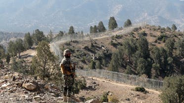 A Pakistani soldier stands guard along the border fence at the Angoor Adda outpost on the border with Afghanistan in South Waziristan, Pakistan. (File photo: Reuters)