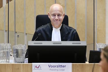 Judge Hendrik Steenhuis opens the court session of the MH17 trial resumed in the high-security courtroom of The Schiphol Judicial Complex (JCS) in Badhoevedorp, The Netherlands, on August 31, 2020. (AFP)