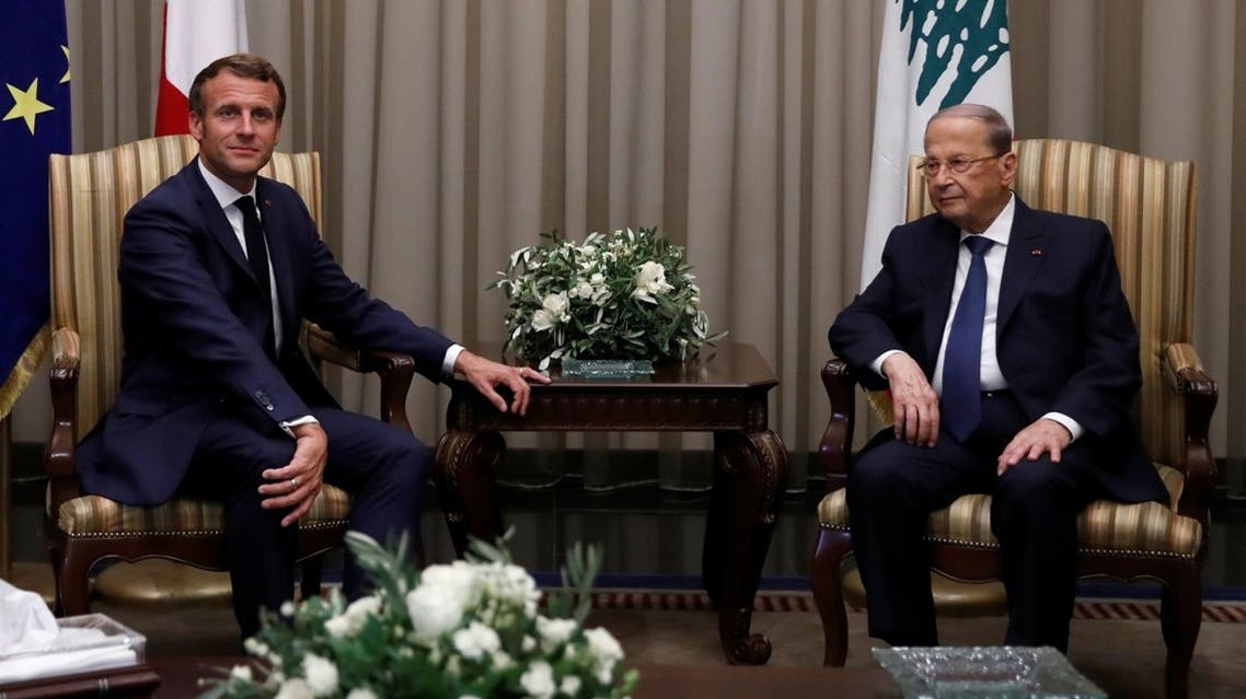 Lebanese President Michel Aoun welcomes French President Emmanuel Macron at Beirut International airport, Lebanon August 31, 2020. REUTERS