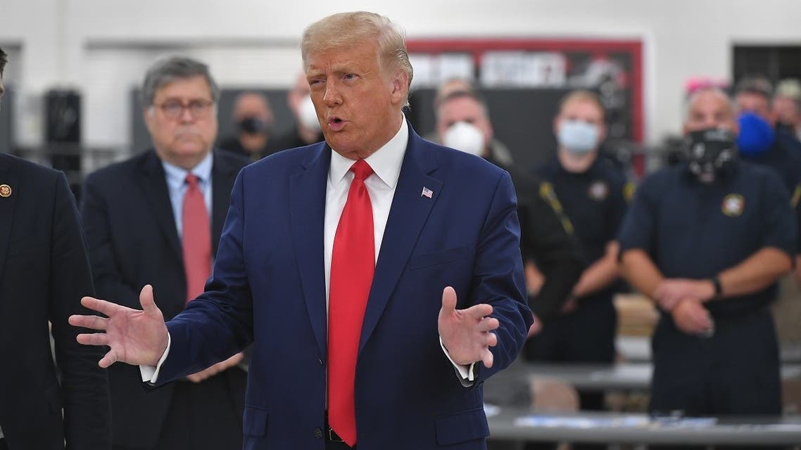 US President Donald Trump speaks with officials on September 1, 2020, at Mary D. Bradford High School in Kenosha, Wisconsin. (AFP)