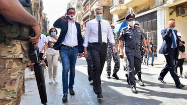 Lebanon's newly-appointed Prime Minister Mustapha Adib (C) visits Beirut's badly-hit Gemmayzeh neighbourhood, on August 31, 2020. (AFP)