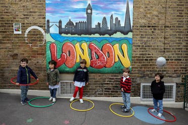 Children use hoops amid the coronavirus pandemic at a school in Fulham, London. (File photo: Reuters)