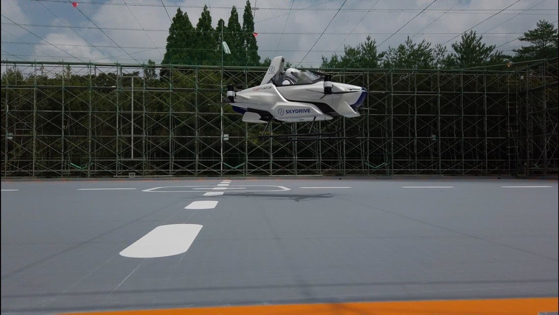 This handout picture taken in August 2020 obtained on September 2, 2020 from shows the SD-03 manned flying car during a test flight at Toyota test field in Toyota city, Aichi prefecture. (AFP/SkyDrive / CARTIVATOR)