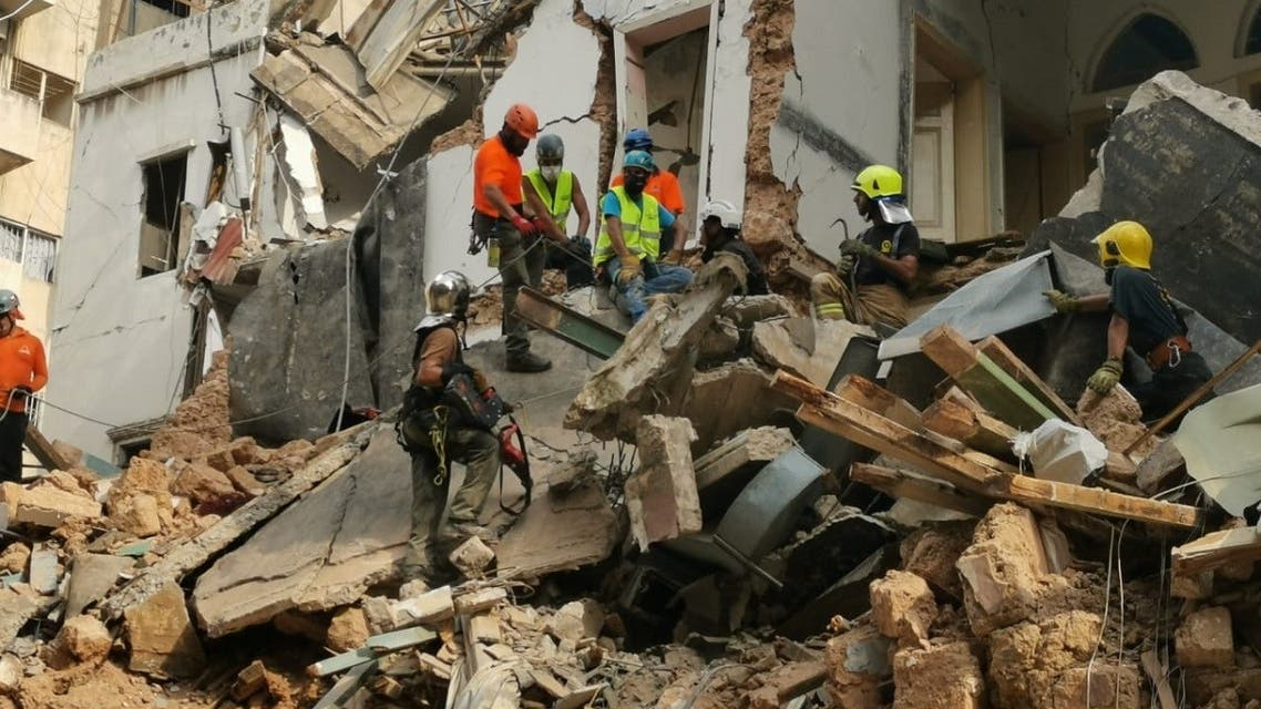 A rescue team searches the rubble in Beirut's Mar Mikhael area. (Twitter)