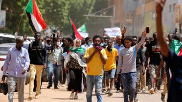 Sudanese protesters march to the Cabinet headquarters in the capital, Khartoum, Sudan, Aug. 17, 2020. (AP)