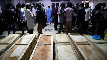 Coffins of victims are seen at a hospital, after a gas pipeline blast at a mosque in Narayanganj, near Dhaka, Bangladesh, September 5, 2020. (Reuters)
