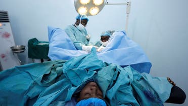 Doctors perform a surgery for a patient at an obstetric fistula repair centre in Maiduguri, Nigeria July 31, 2018. (Reuters)