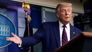 President Donald Trump gestures for Larry Kudlow, White House chief economic adviser, to speak during a news conference in the James Brady Press Briefing Room at the White House, Friday, Sept. 4, 2020, in Washington. (AP)