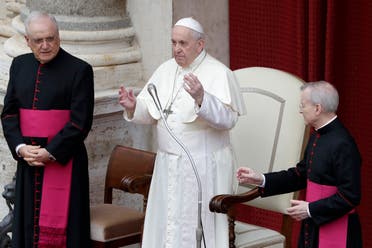 Pope Francis, center, delivers his message during his general audience, the first with faithful since February when the coronavirus outbreak broke out, at the San Damaso courtyard, at the Vatican, Wednesday, Sept. 2, 2020. (AP)