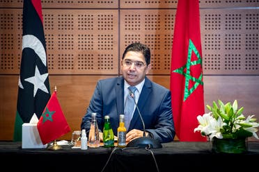 Nasser Bourita, Morocco's Minister of Foreign Affairs and International Cooperation, chairs a meeting of representatives of Libya's rival administrations in the coastal town of Bouznika, south of Rabat, on September 6, 2020. (AFP)