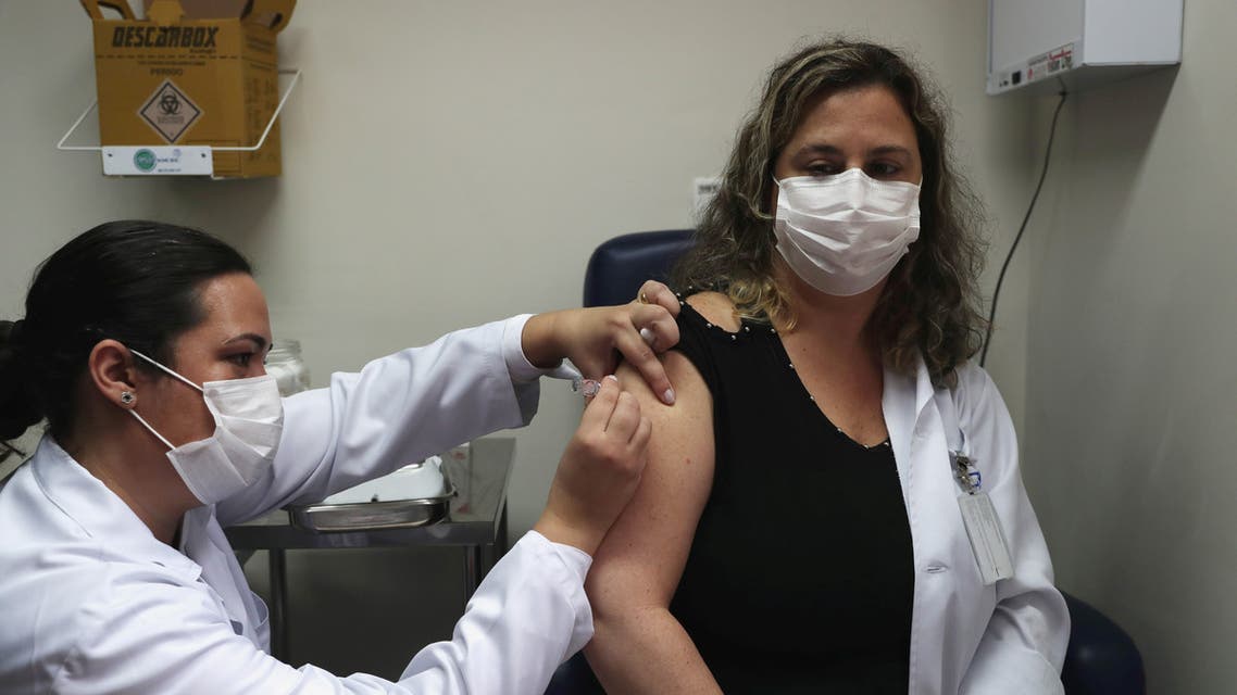 A nurse administers China's SinoVac coronavirus potential vaccine to a volunteer and nurse Sarah Rangon at Emilio Ribas Institute in Sao Paulo, Brazil July 30, 2020. (Reuters)