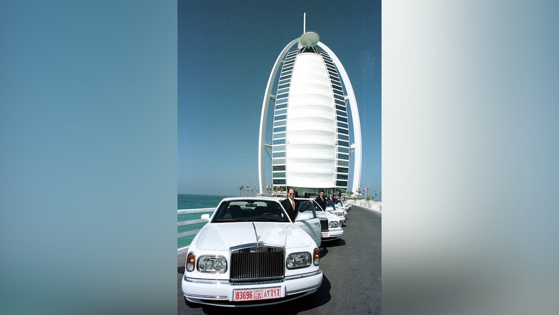 Rolls Royce queue on the causeway to Dubai's Burj Al-Arab hotel 11 November 1999. (AFP)