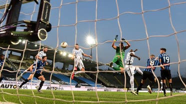 Inter Milan's Italian defender Danilo D'Ambrosio(L) scores the opening goal during the Italian Serie A football match Atalanta vs Inter played behind closed doors. (File photo: AFP)
