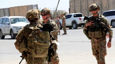 U.S. soldiers are seen during a handover ceremony of Taji military base from US-led coalition troops to Iraqi security forces, in the base north of Baghdad, Iraq August 23, 2020. REUTERS/Thaier Al-Sudani