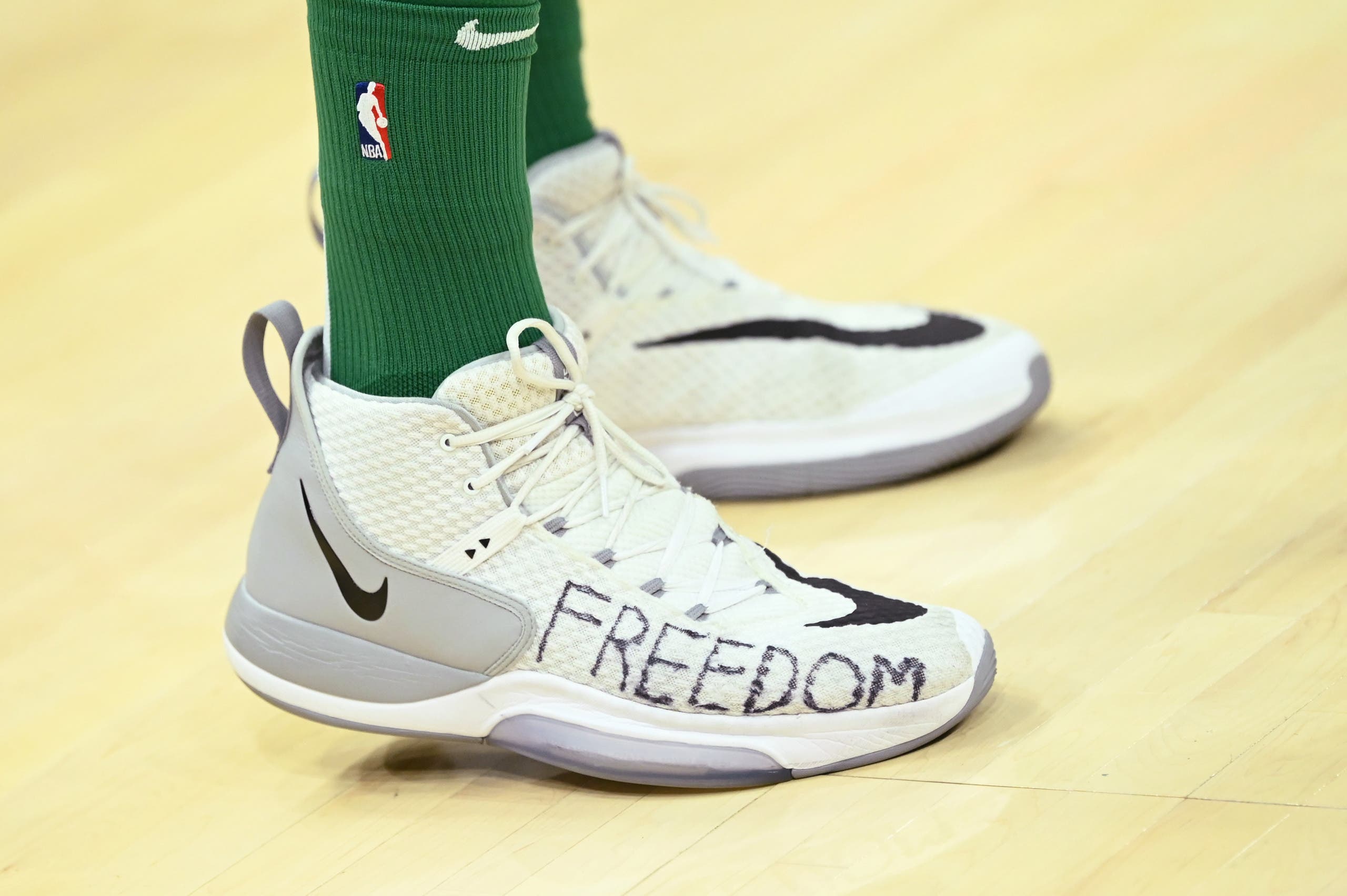 A detail of the shoes of Boston Celtics center Enes Kanter (11) before the game at Rocket Mortgage FieldHouse. (Reuters)