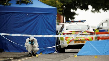 A forensic worker investigates at the scene of reported stabbings in Birmingham, Britain. (Reuters)