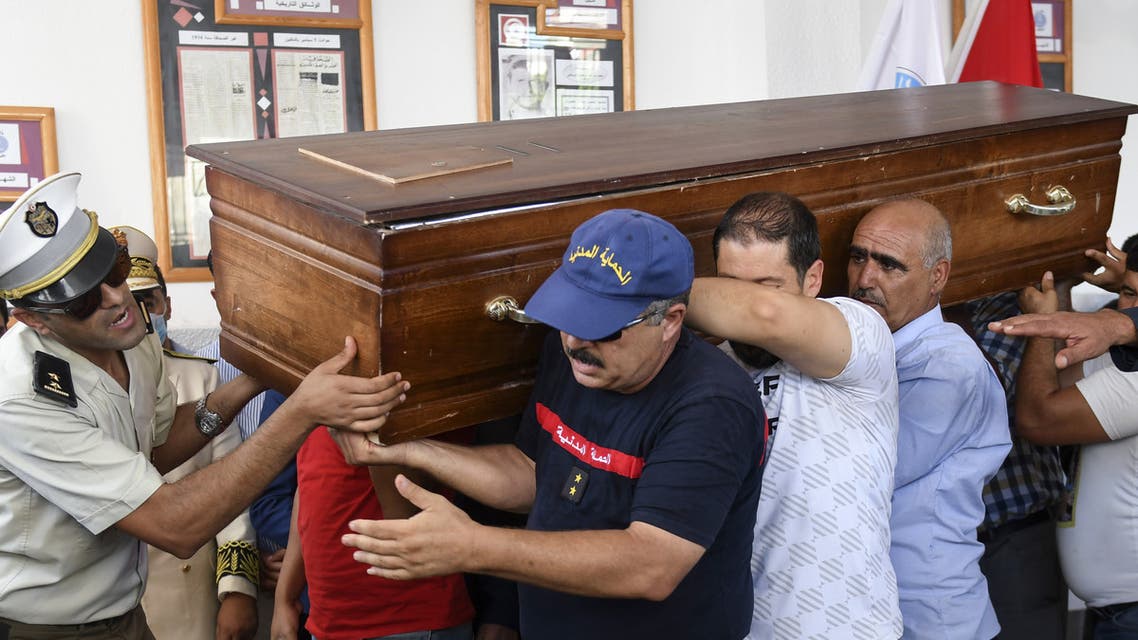 Members of the Tunisian National guard carry the coffin of a fellow officer during his funeral in the Moknine suburb of Sousse, on September 7, 2020, a day after he was killed in an attack on a touristic district of the coastal city. The Islamic State group claimed responsibility for a knife attack in Tunisia which killed one National Guard officer and wounded another, as security forces rounded up more suspects.
