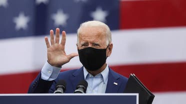 Democratic US presidential nominee Joe Biden waves at a campaign event in Michigan, Sept. 9, 2020. (Reuters)