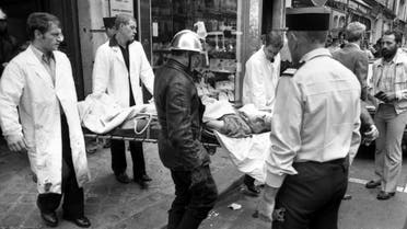 rried away on a stretcher from the scene of a terror attack at Jewish restaurant and deli Jo Goldenberg in Paris, France, on August 9, 1982. (AP)