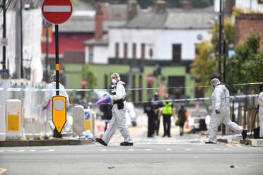 Police forensic officers investigate after stabbings in Birmingham, northern England, Sunday Sept. 6, 2020. (AP)