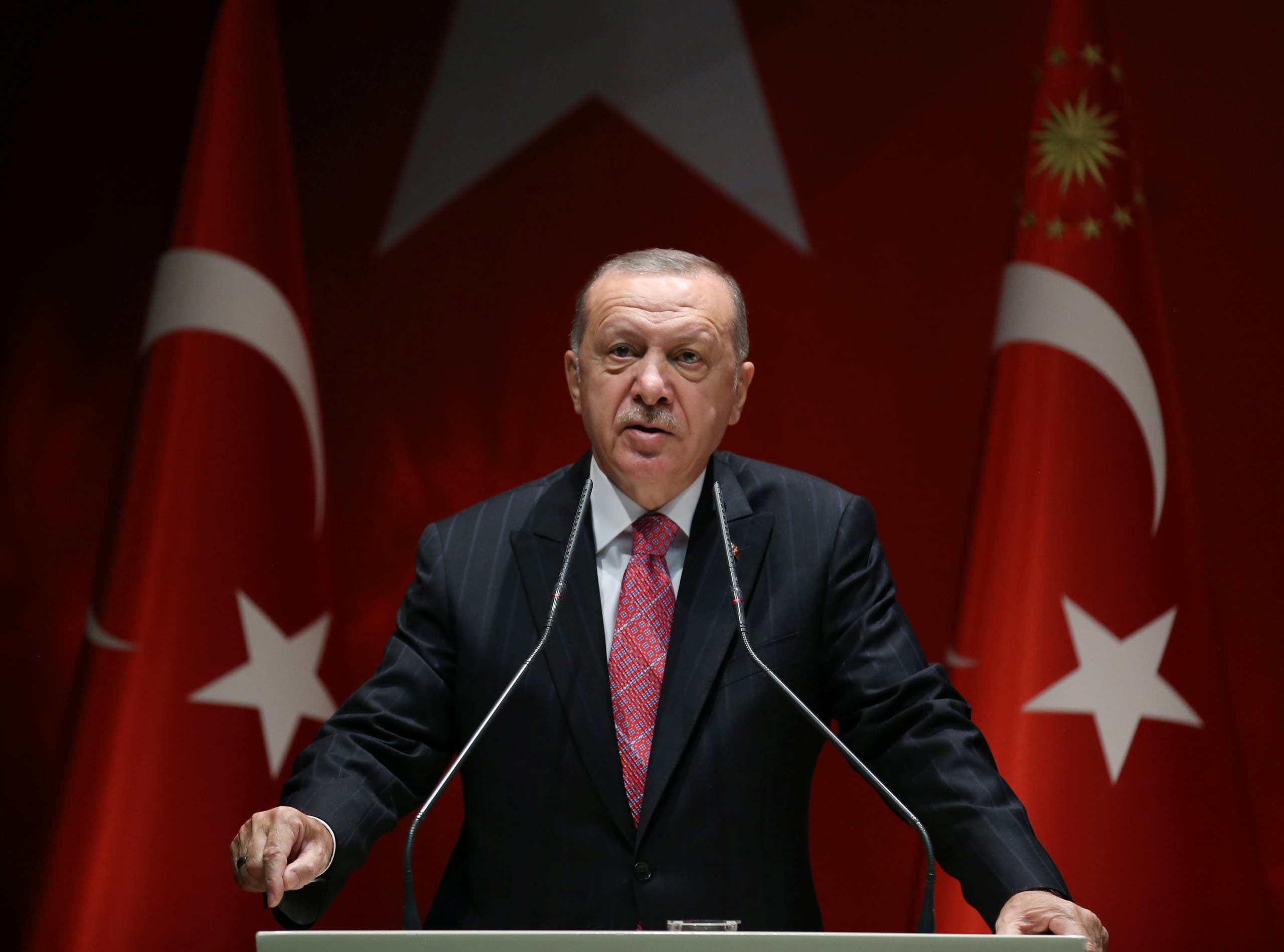 Turkish President Tayyip Erdogan speaks during a meeting of his ruling AK Party in Ankara, Turkey, August 13, 2020. (Presidential Press Office handout via Reuters)