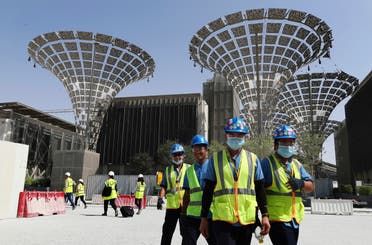Technicians walk at the three thematic districts at the under construction site of the Expo 2020 in Dubai, United Arab Emirates. (AP)