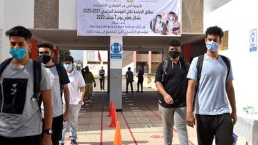 Students in Morocco arrive to school on the first day of classes amid measures put in place by Moroccan authorities in bid to stop the spread of Covid-19 on September 7, 2020. (AFP)