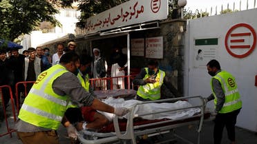 Afghan men carry an injured to a hospital after a blast in Kabul, Afghanistan September 9, 2020. (Reuters)