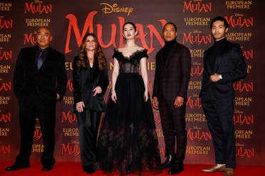 Cast members Ron Yuan, Yifei Liu, Jason Scott Lee and Yoson An pose with director Niki Caro, at the European premiere for the film “Mulan” in London, Britain, on March 12, 2020. (Reuters)
