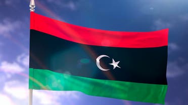 Flag of Libya with flare and dark blue sky stock photo
