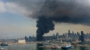 Black smoke rises from a fire at the seaport in Beirut on Sept. 10. 2020. (AP)