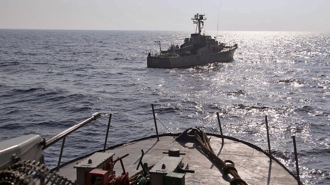 an Iranian navy warship during the second day of a military exercise in the Gulf, near the strategic strait of Hormuz in southern Iran. (AFP)