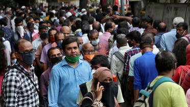 202People wait to board passenger buses during rush hour at a bus terminal, amidst the coronavirus  outbreak, in Mumbai, India, on September 9, 2020. (Reuters)0-09-11T105112Z_1257836207_RC2AWI91TP7U_RTRMADP_3_HEALTH-CORONAVIRUS-INDIA-MAHARASHTRA