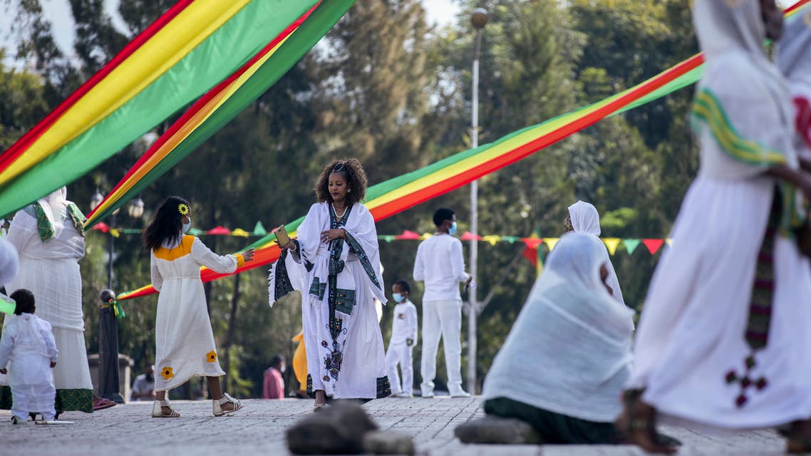 Ethiopian Orthodox faithful attend a prayer ceremony to mark the holiday of Enkutatash, the first day of the new year in the Ethiopian calendar, which is traditionally associated with the return of the Queen of Sheba to Ethiopia some 3,000 years ago, at Bole Medhane Alem Ethiopian Orthodox Cathedral in the capital Addis Ababa, Ethiopia Friday, Sept. 11, 2020. (AP)