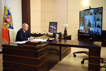 Russian President Vladimir Putin chairs a meeting with members of the government via video link at the Novo-Ogaryovo state residence outside Moscow, Russia. (Reuters)