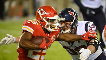Houston Texans defensive end J.J. Watt (99) tries to tackle Kansas City Chiefs running back Clyde Edwards-Helaire (25) during an NFL football game. (AP)