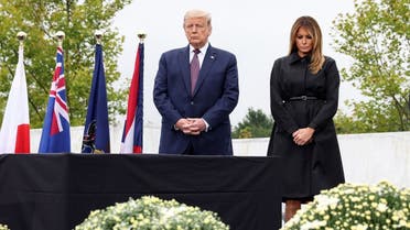 President Donald Trump and first lady Melania Trump attend a ceremony at the National Memorial, remembering those killed when hijacked Flight 93 crashed into an open field on September 11, 2001, in Stoystown, Pennsylvania, onSeptember 11, 2020. (Reuters)