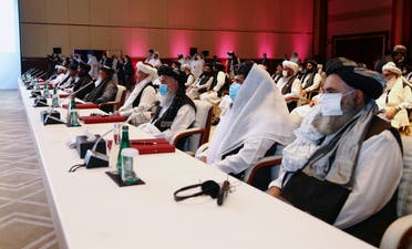 Delegates attend talks between the Afghan government and Taliban insurgents in Doha, Qatar September 12, 2020. (Reuters)