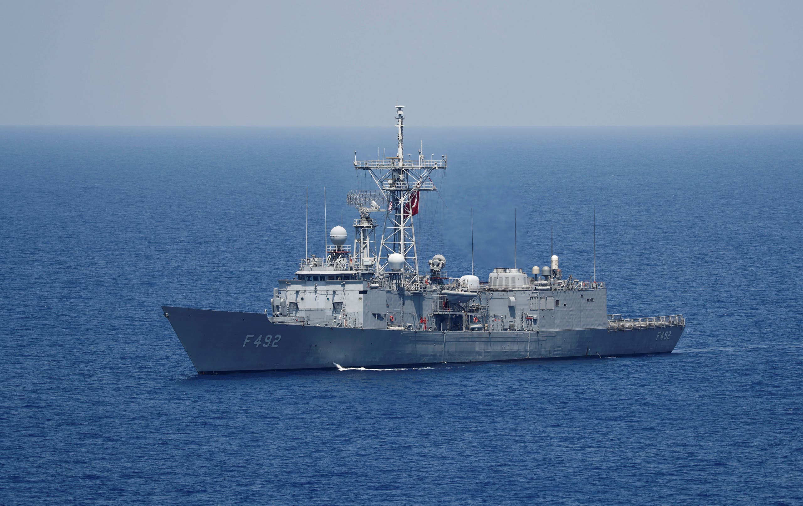 Turkish Navy frigate TCG Gemlik (F-492) escorts Turkish drilling vessel Yavuz in the eastern Mediterranean Sea off Cyprus, August 6, 2019. (Reuters)