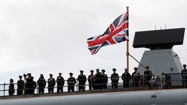 Sailors stand on the deck of Britain's second new Queen Elizabeth class aircraft carrier HMS Prince of Wales, in 2017. (Reuters)