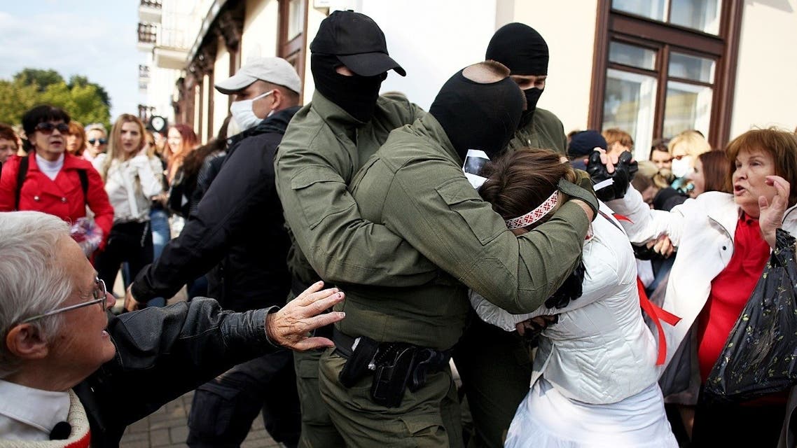 Belarus law enforcement officers detain protesters during a rally to protest against the presidential election results in Minsk on Sept. 12, 2020. (AFP)