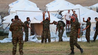 Greek PM Mitsotakis promises permanent migrant center after fire on Lesbos