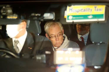 Greg Kelly, the former deputy of ousted Nissan chairman Carlos Ghosn, is seen in the car, as he leaves after being released from a detention centre in Tokyo, Japan, December 25, 2018. (Reuters)