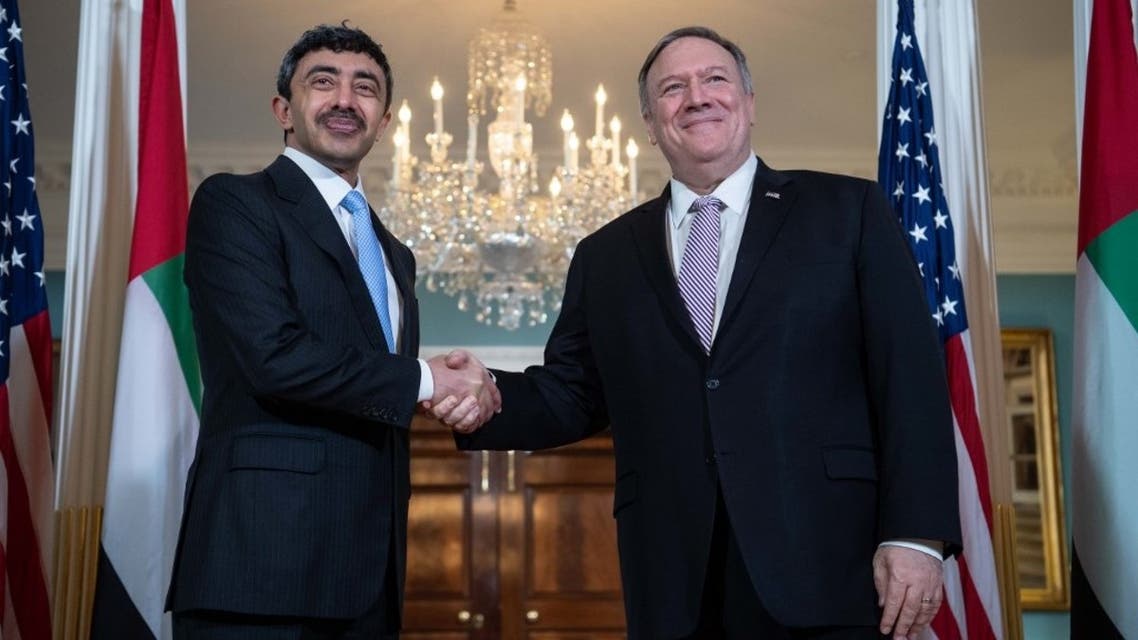 US Secretary of State Mike Pompeo (R) and Emirati Foreign Minister Abdullah bin Zayed al- Nahyan shake hands prior to talk at the State Department in Washington, DC, on November 22, 2019. (AFP)