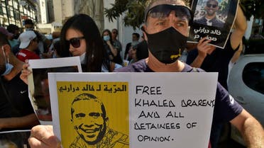 Algerian protesters call for the release from jail of journalist Khaled Drareni, on September 14, 2020 in Algiers. (AFP)
