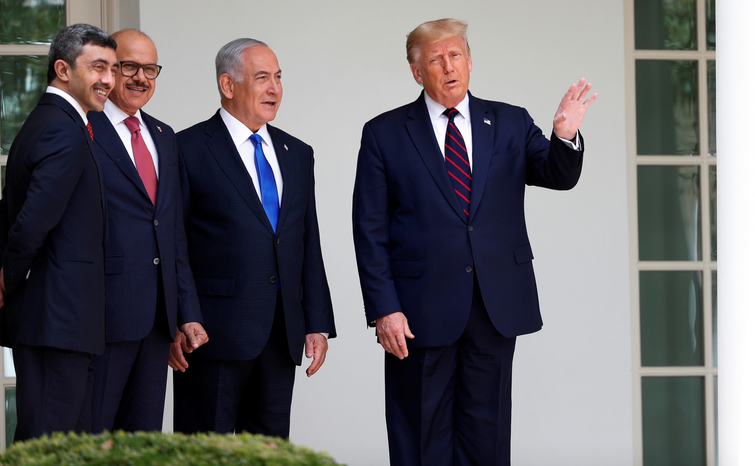 U.S. President Donald Trump talks with United Arab Emirates (UAE) Foreign Minister Abdullah bin Zayed, Bahrain's Foreign Minister Abdullatif Al Zayani and Israel's Prime Minister Benjamin Netanyahu as they stand together on the West Wing colonnade before the signing of the Abraham Accords (File photo: Reuters)