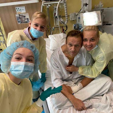 This handout picture posted on September 15, 2020 shows Russian opposition leader Alexei Navalny posing for a selfie picture with his family at Berlin’s Charite hospital. (Instagram)