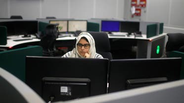 A Saudi Arabian woman works inside a call center in Mecca. (File photo: Reuters)