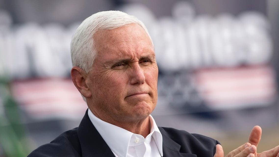 US VP Mike Pence claps at a Republican campaign rally in Belgrade, Montana, Sept. 14, 2020. (AP)