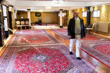 A man walks in the Zahra Centre in Grande Synthe, France. (AFP)